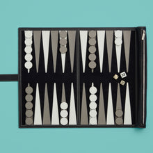 Load image into Gallery viewer, Luxury black leather travel backgammon set, shown unrolled, exposing leather backgammon board, with pieces and dice