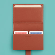 Load image into Gallery viewer, High-end leather game card case with white contrast stitching. Brown leather, shown open with two decks of playing cards (included).
