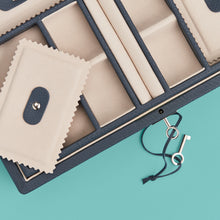 Load image into Gallery viewer, Luxury leather jewelry box, navy / blue color, with lock and key, close up shot to show detail of compartments and trays