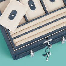 Load image into Gallery viewer, High-end leather jewelry box with 4 drawers. Navy blue leather, detail shot of drawers and lock and key.