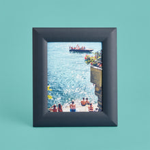 Load image into Gallery viewer, Blue / navy luxury leather picture frame, holds 8x10" photo, shown standing vertically