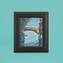 Load image into Gallery viewer, Black luxury leather picture frame, holds 8x10" photo, standing vertically