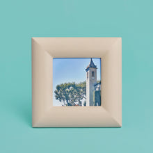 Load image into Gallery viewer, High-end leather picture frame, holds 5x5 photo, cream leather, shown head-on
