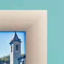 Load image into Gallery viewer, High-end leather picture frame, holds 5x5 photo, cream leather, corner shown in close-up to show high-quality leather