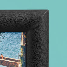 Load image into Gallery viewer, Black luxury leather picture frame, holds 5x7" photo, shown close-up to show detail of pebbled black leather