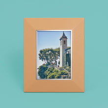 Load image into Gallery viewer, High-end leather picture frame with silver interior detail, holds 5x7 photo, tan leather, standing vertically