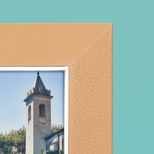 Load image into Gallery viewer, High-end leather picture frame with silver interior detail, holds 5x7 photo, tan leather, close-up of corner shown