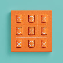Load image into Gallery viewer, Luxury leather tic tac toe board with white stitching. Shown in orange leather.