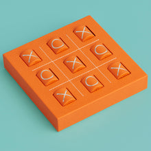 Load image into Gallery viewer, Luxury leather tic tac toe board with white stitching. Shown in orange leather.