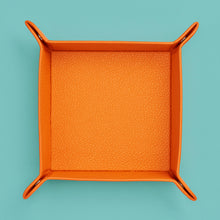 Load image into Gallery viewer, High-end leather valet tray, orange leather, shot from above.