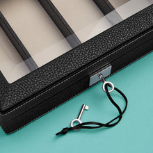 Load image into Gallery viewer, Luxury leather watch case, black leather with white stitching, space for 4 watches, close-up of stitching, leather, and key.