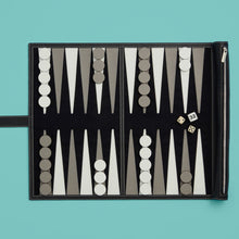 Load image into Gallery viewer, Luxury black leather travel backgammon set, shown unrolled, exposing leather backgammon board, with pieces and dice

