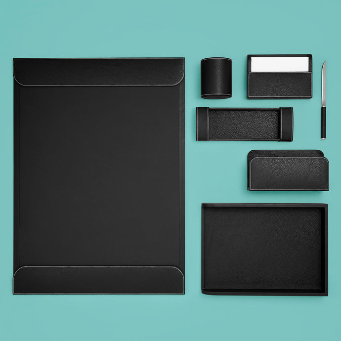 High-end black leather desk set, shown with all components. Pictured: blotter, memo box, letter rack, letter opener, letter tray, pen tray, and pen cup.