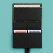 Load image into Gallery viewer, High-end leather game card case with white contrast stitching. Black leather, shown open with two decks of playing cards (included).
