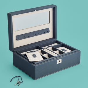 Luxury leather jewelry box, navy / blue color, with lock and key, opened to show mirror inside