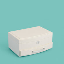 Load image into Gallery viewer, High-end leather jewelry box with drawer. Cream white leather, shown closed.
