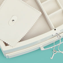 Load image into Gallery viewer, High-end leather jewelry box with drawer. Cream white leather, detail shot of drawers and lock and key.

