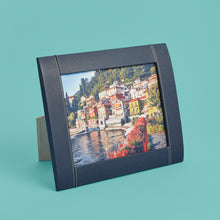 Load image into Gallery viewer, Navy blue leather picture frame with white stitching detail, holds 8x10&quot; photo
