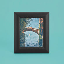 Load image into Gallery viewer, Black luxury leather picture frame, holds 8x10&quot; photo, standing vertically
