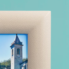 Load image into Gallery viewer, High-end leather picture frame, holds 5x5 photo, cream leather, corner shown in close-up to show high-quality leather
