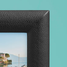 Load image into Gallery viewer, High-end leather picture frame, holds 5x5 photo, black leather, close-up of corner to show leather detail
