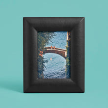 Load image into Gallery viewer, Black luxury leather picture frame, holds 5x7&quot; photo, shown vertically
