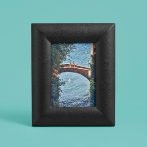 Black luxury leather picture frame, holds 5x7" photo, shown vertically