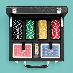 High-end leather poker case, black leather. Shown open with poker chips and playing cards.