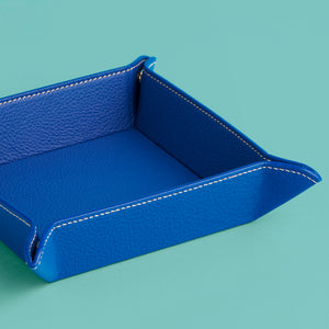 High-end leather valet tray, blue leather with white stitching.